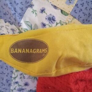 Banana gram word game holding case is banana shaped brand new